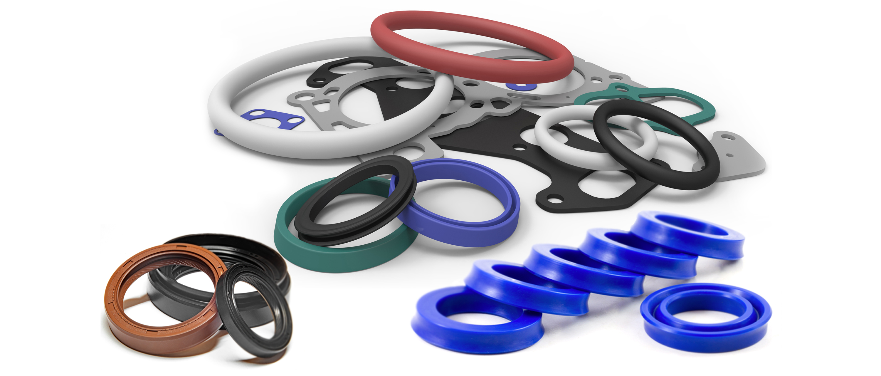 A variety of hydraulic seals in many colors and different sizes.